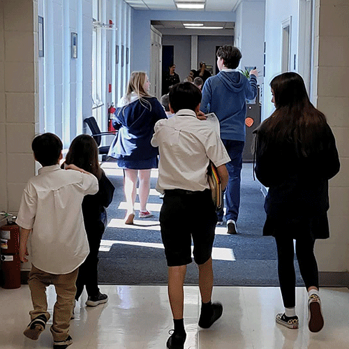 Students walking down the hall